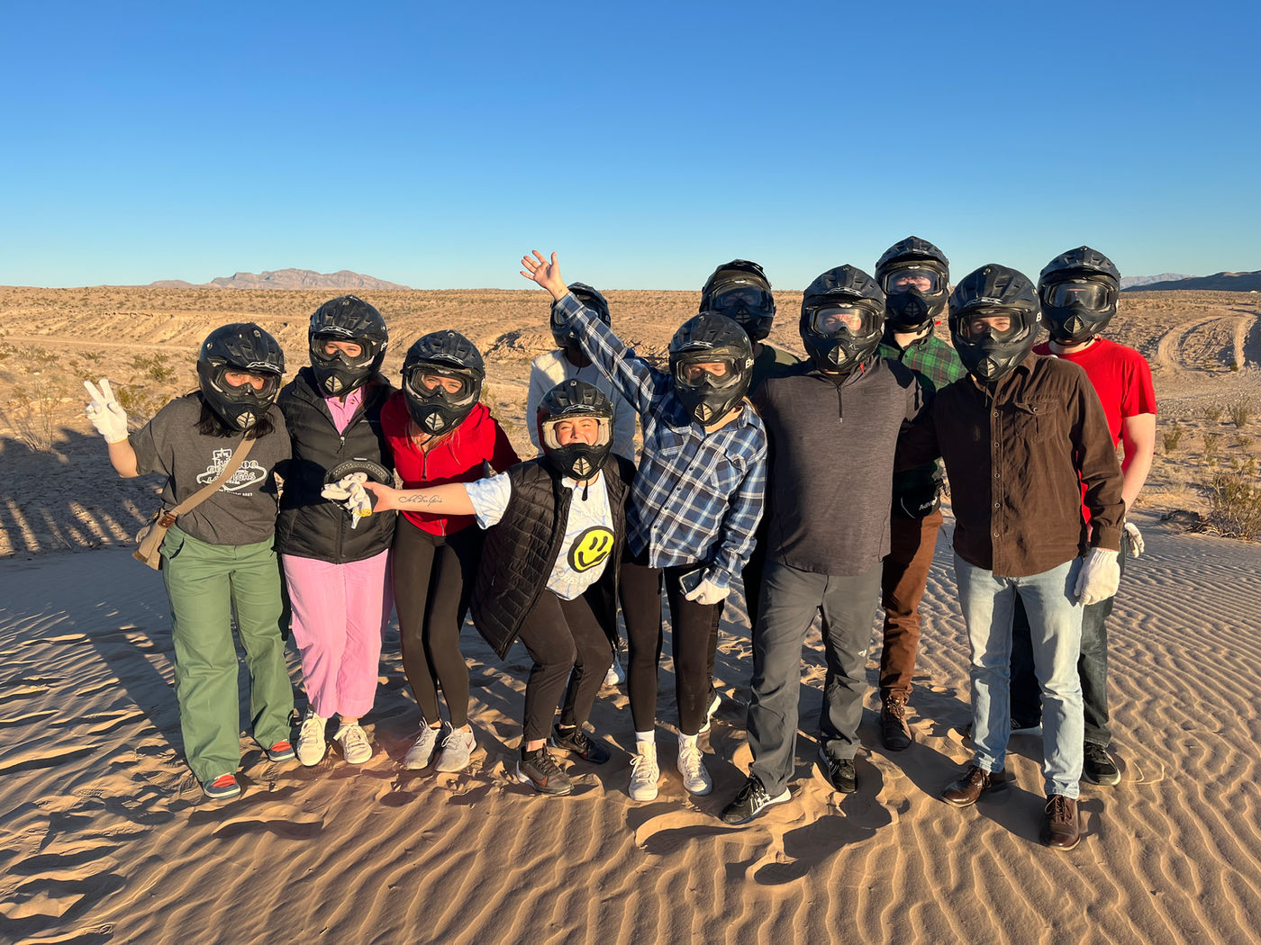 Team photo on the sand dunes